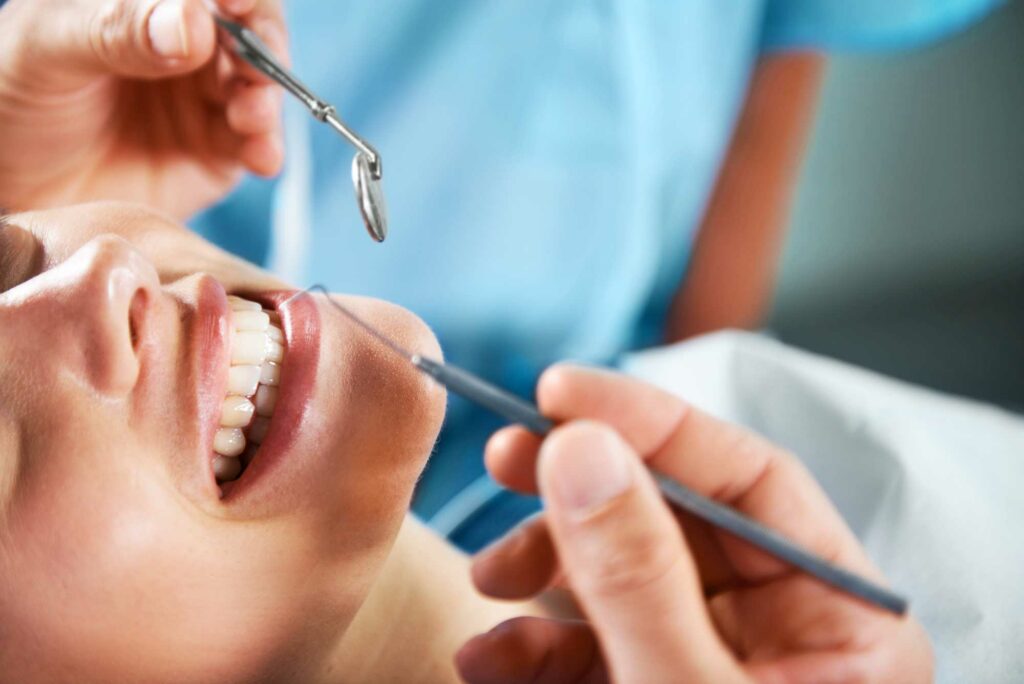 woman getting her teeth cleaned