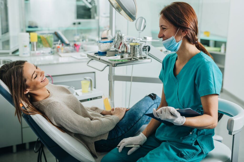 Stock image of a dental hygienist and a patient
